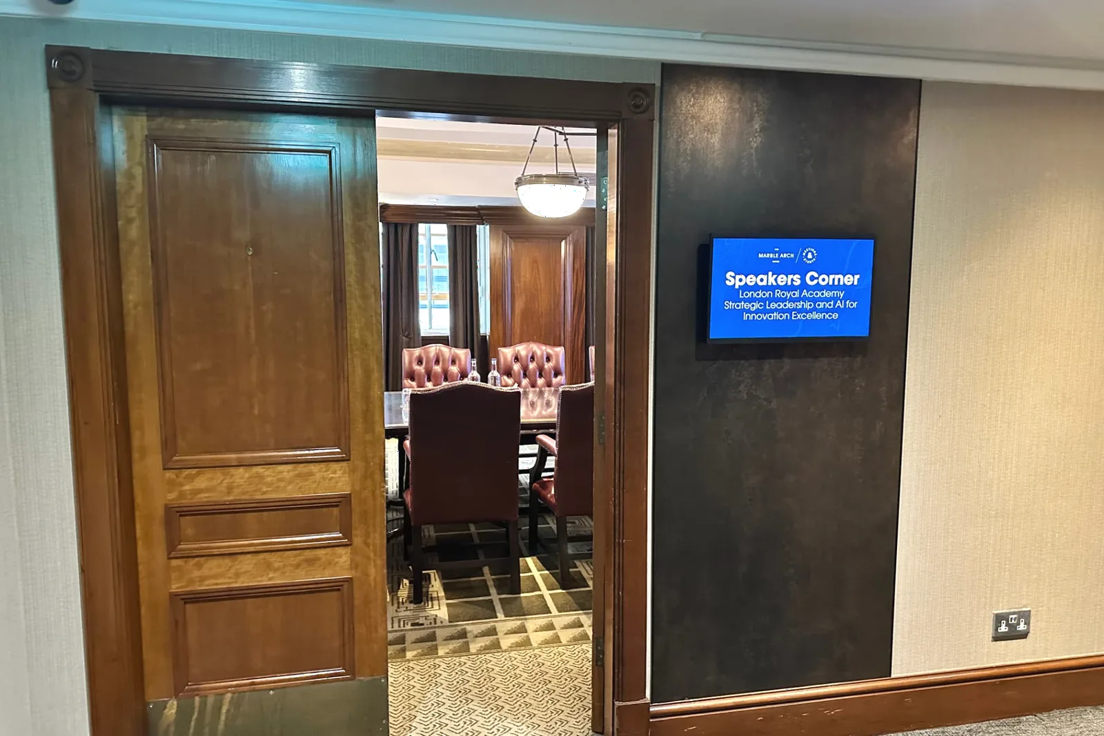 A London Royal Academy programme room in central London, signposted at the door